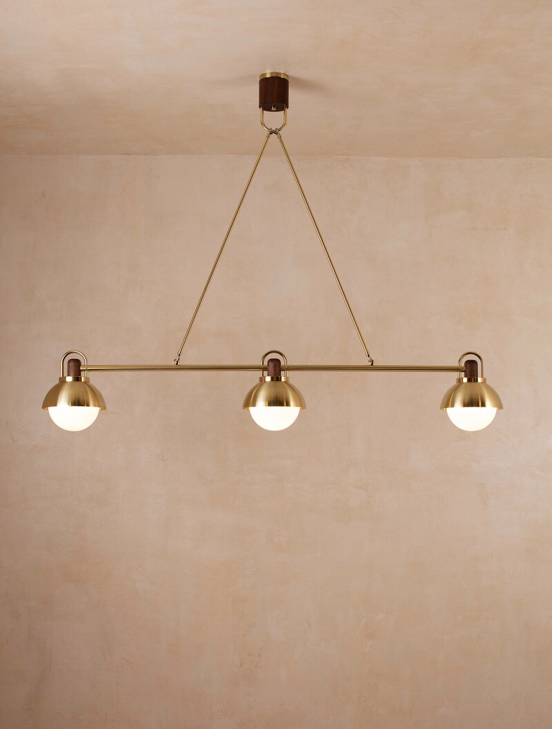 3 Arc Island shown in Brass, Black Walnut, Opal Globe